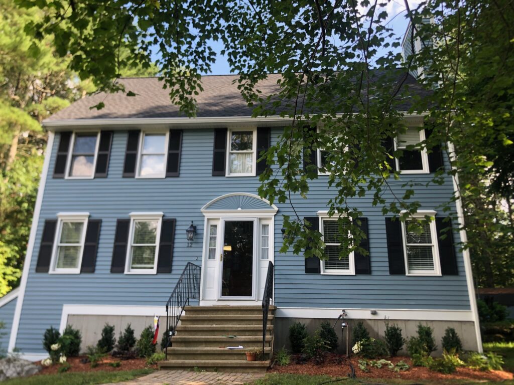 An excavator both dug out the old soil and laid the new soil. This north facing garden now has 19 shrubs and 30 perennials! Greenleaf’s Garden Design specializes in Garden Design, Maintenance, and Installation within 45 miles of Tyngsboro MA.
