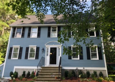 An excavator both dug out the old soil and laid the new soil. This north facing garden now has 19 shrubs and 30 perennials! Greenleaf’s Garden Design specializes in Garden Design, Maintenance, and Installation within 45 miles of Tyngsboro MA.