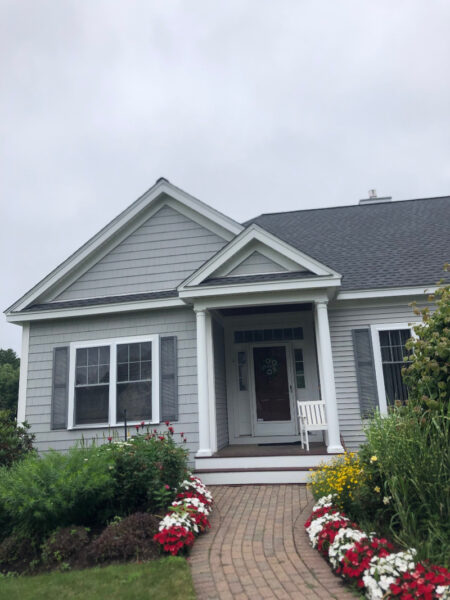 Garden Design in Bedford, NH Status Report The red and white New Guinee’s are blooming away!