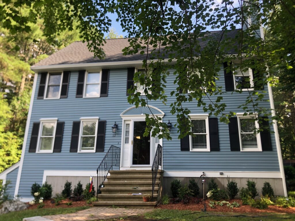 An excavator both dug out the old soil and laid the new soil. This north facing garden now has 19 shrubs and 30 perennials! Greenleaf’s Garden Design specializes in Garden Design, Maintenance, and Installation within 45 miles of Tyngsboro MA.