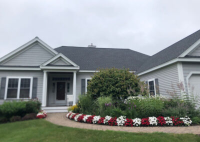 Garden Design in Bedford, NH Status Report The red and white New Guinee’s are blooming away!