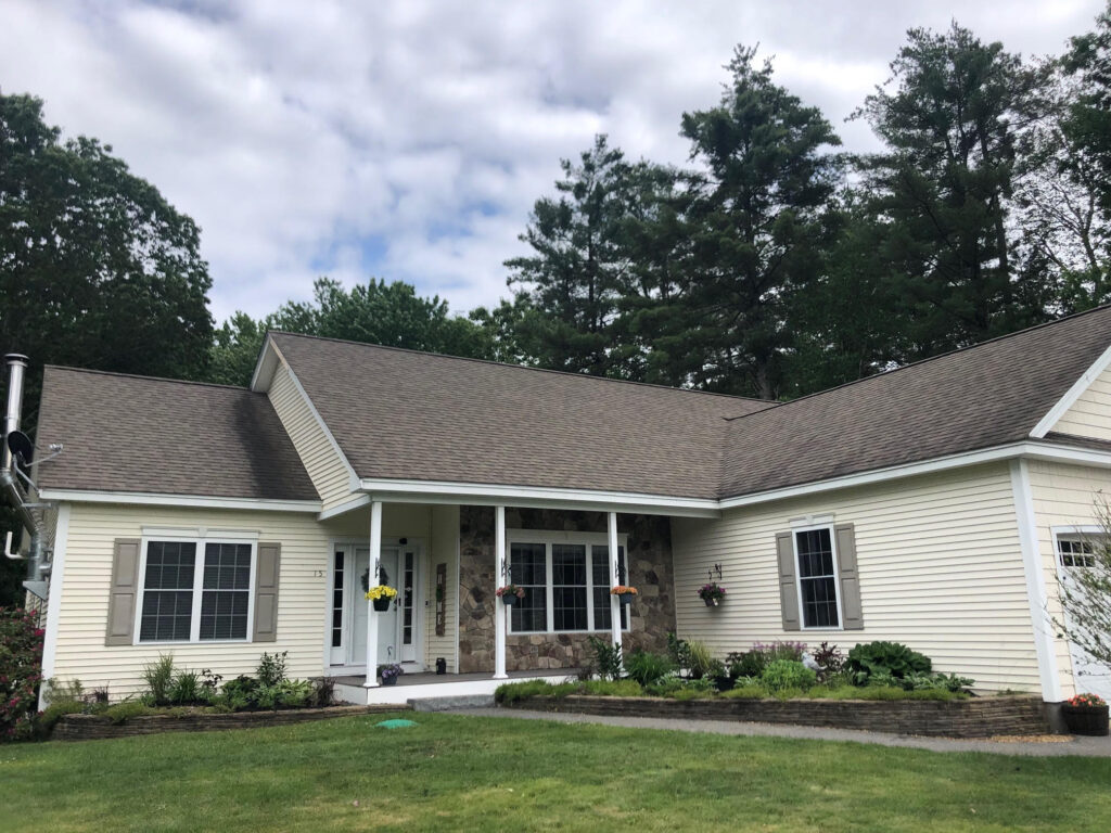 We added 53 perennials and 10 annuals for this low maintenance setup in Pelham, NH