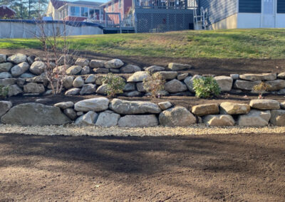 Fixing a rock wall in Dracut, MA