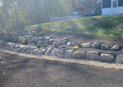 Fixing a rock wall in Dracut, MA