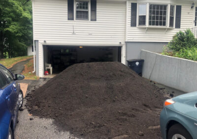 For this project, Greenleaf’s Garden Design transformed this cooked Nashua, NH lawn into a lovely garden. The project took 6 hours. We used 116 Perennials, 6 shrubs,16 yards of Garden Mix, and 6 yards of black mulch. Greenleaf’s Garden Design specializes in Garden Design, Maintenance, and Installation within 25 miles of Tyngsboro MA.