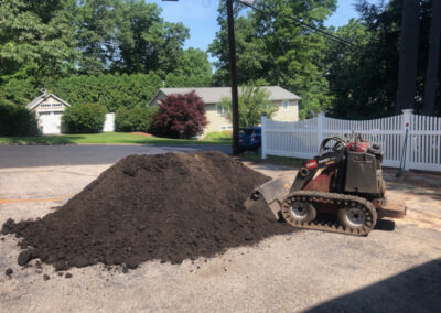 For this project, Greenleaf’s Garden Design transformed this cooked Nashua, NH lawn into a lovely garden. The project took 6 hours. We used 116 Perennials, 6 shrubs,16 yards of Garden Mix, and 6 yards of black mulch. Greenleaf’s Garden Design specializes in Garden Design, Maintenance, and Installation within 25 miles of Tyngsboro MA.