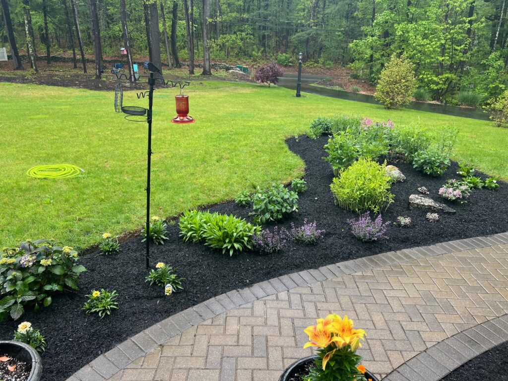 mulch and edging by Greenleaf's Garden Design