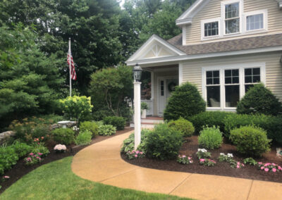 This client in Merrimack, NH, had 2 yards of mulch delivered. Our crew from Greenleaf’s Garden Design spread it the same day. It turns out he needed another yard to finish. A week later we returned to spread the rest.