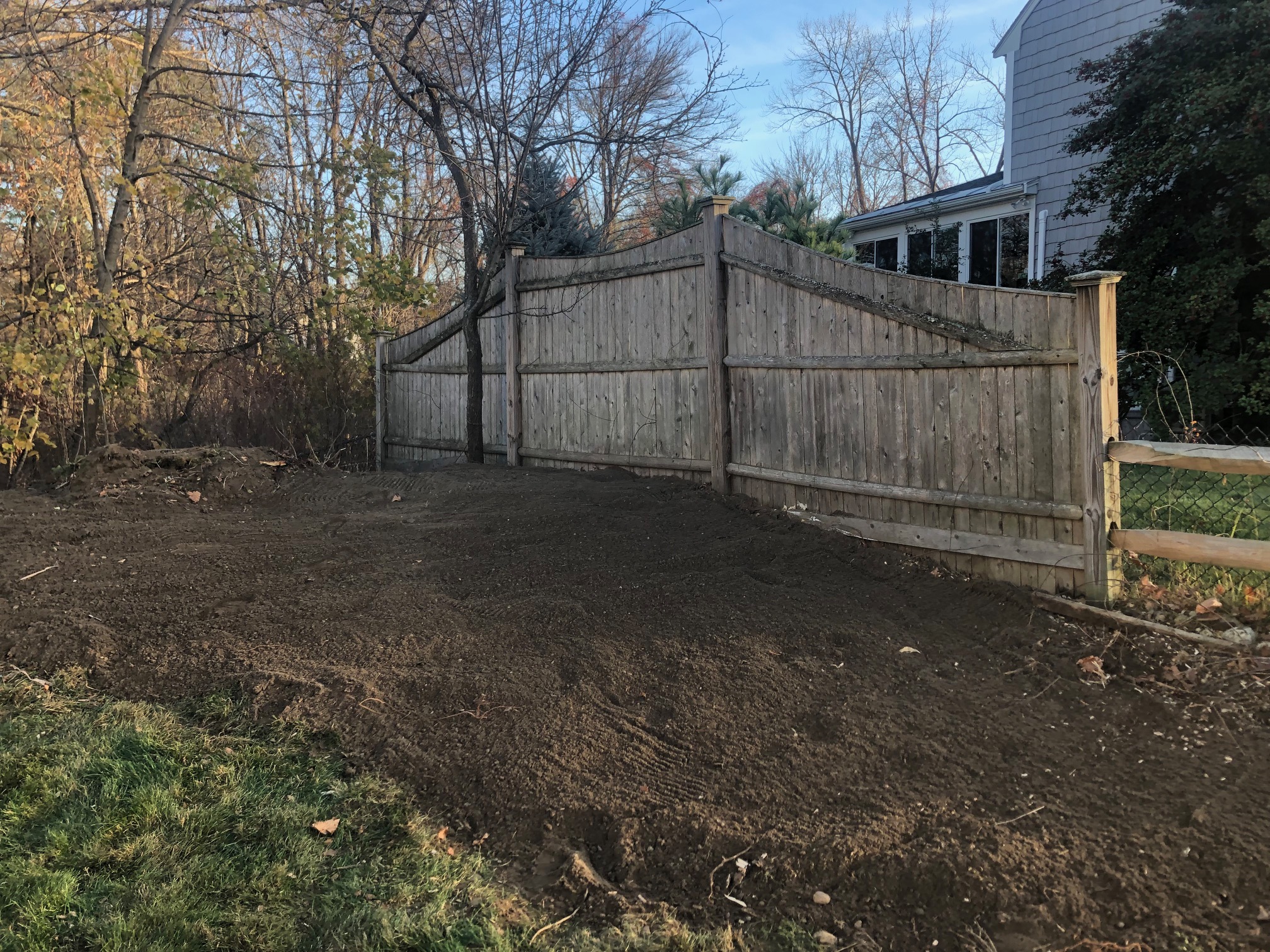 Mulch and Loam installation in Chelmsford, MA.