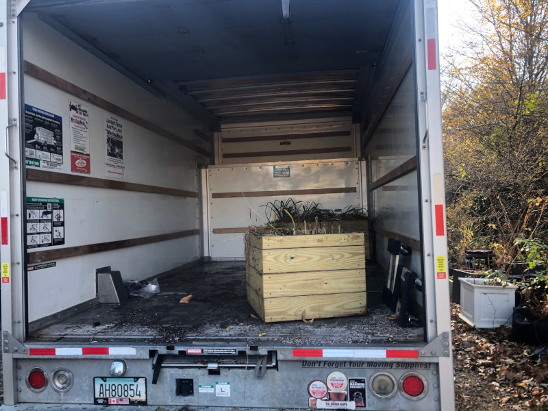 This Byfield, MA client had to move his plants from Brookline to Byfield. It took an hour to drive there. We unloaded the U-Haul truck with the Dingo Forks. It took an hour for the crew from Greenleaf’s Garden Design to move the 15 planter boxes/whiskey barrels.