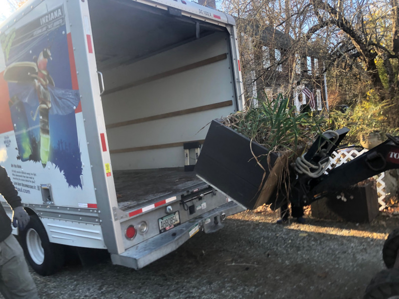 This Byfield, MA client had to move his plants from Brookline to Byfield. It took an hour to drive there. We unloaded the U-Haul truck with the Dingo Forks. It took an hour for the crew from Greenleaf’s Garden Design to move the 15 planter boxes/whiskey barrels.