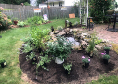 Summer’s here, and it’s the perfect time to give your perennial garden a glow-up! For this garden redesign project in Hudson, NH, we used the Excavator to dig out 10 yards of poor soil and replaced it with seven yards of good soil. Last year , in early July, we planted 100 perennials which were a mix of shade and sun loving. These new perennials really made the spot beautiful. Have questions about your garden redesign or need plant recommendations? Drop us a message or give us a call and let Greenleaf’s Garden Design get your garden blooming!