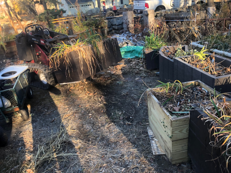 This Byfield, MA client had to move his plants from Brookline to Byfield. It took an hour to drive there. We unloaded the U-Haul truck with the Dingo Forks. It took an hour for the crew from Greenleaf’s Garden Design to move the 15 planter boxes/whiskey barrels.