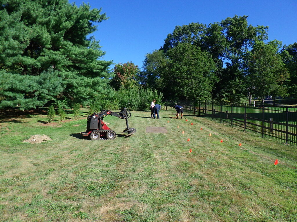 Garden design in Groton, MA. Planting 100 ornamental and evergreen trees.