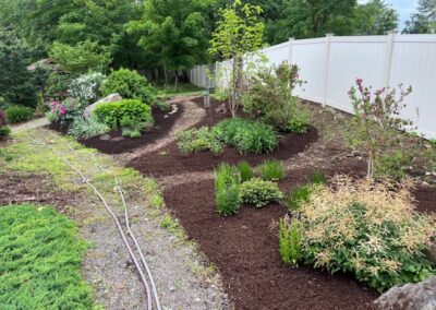 For this project in Merrimack, NH, we provided and installed mulch for the existing gardens. Have questions about your garden redesign or need plant recommendations? Drop us a message or give us a call and let Greenleaf’s Garden Design get your garden blooming!