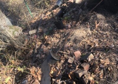 Garden Maintenance and Garden Installation in Merrimack, NH. Our Merrimack, NH client had us pull out honeysuckle bushes and bittersweet with the Dingo. We then planted 25 Staghorn and 25 Low Grow Sumac along a riverbank. Each hole had 3 shovels of compost.