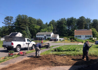 We were called in to see if this old garden in Billerica, MA with bittersweet could be saved. I said the best bet is to dig everything up and go down 8” deep. The Dingo made short work of removing the 7 yards of soil and then replacing it. The new 30 summer focused flowering perennials made the bunnies mad because the fence will keep them out!! This garden took 6 hours to complete.