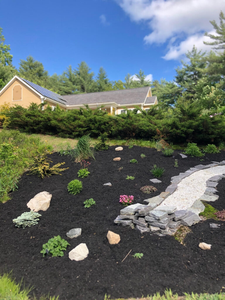 At our 6-year-old North Conway, NH gardens we added 15 annuals, 30 perennials, and 4 yards of black mulch. It took 2 gentlemen 8 hours to complete the renovations.