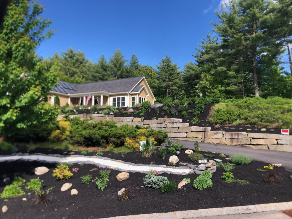 At our 6-year-old North Conway, NH gardens we added 15 annuals, 30 perennials, and 4 yards of black mulch. It took 2 gentlemen 8 hours to complete the renovations.