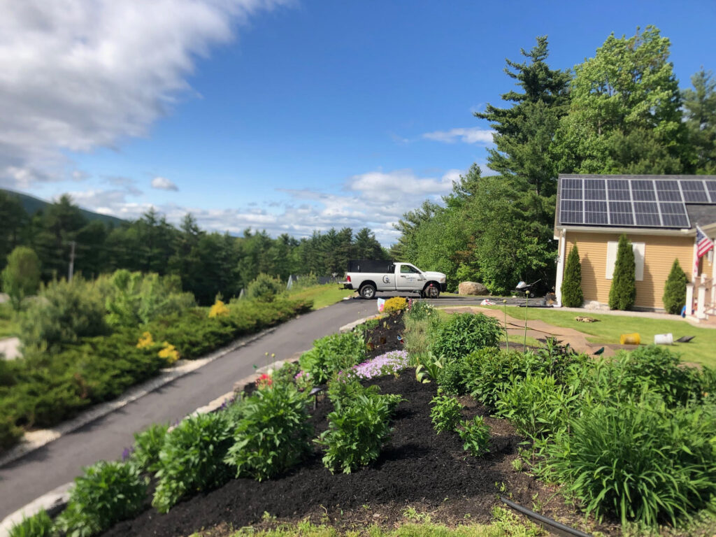 At our 6-year-old North Conway, NH gardens we added 15 annuals, 30 perennials, and 4 yards of black mulch. It took 2 gentlemen 8 hours to complete the renovations.